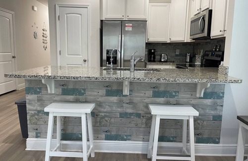 Thomas Drive House | Beach themed 3 bedroom 2 bath townhome with pool view