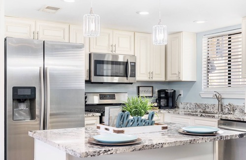 Panama City Beach House | BEACH VACAY- 2 bed 2.5 bath, GOLF CART, 11 POOLS, MINI GOLF- 5 Star Home