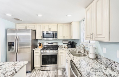Panama City Beach House | BEACH VACAY- 2 bed 2.5 bath, GOLF CART, 11 POOLS, MINI GOLF- 5 Star Home