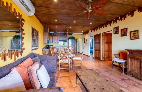 Playa Flamingo Condo | Beachfront Condo with Warm, Rustic Interiors & Direct Access to Playa Flamingo