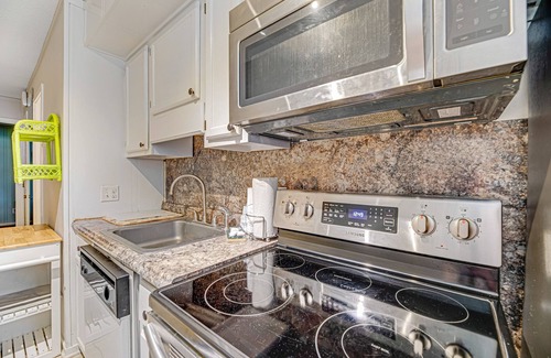 Morehead City Condo | Beachfront condo with indoor/outdoor pools, hot tubs, waterslide, & putt-putt