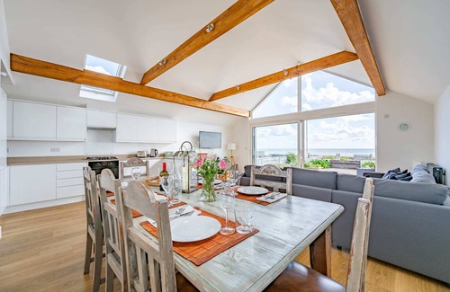 Pevensey House | Beachfront Getaway with Breathtaking Views & Family Comfort.