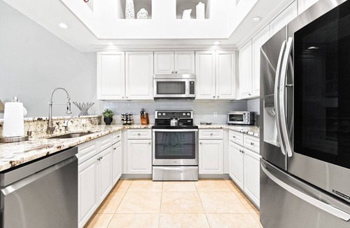 Indian Harbour Beach House | Beachside Townhome Escape – Jacuzzi, Game Room, & Private Backyard!🏖️