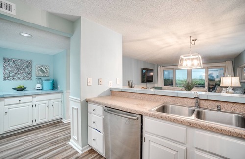 Pine Knoll Shores Condo | Beachwalk 115 - Pine Knoll Shores Oceanfront Condo! Steps to beach. Sleeps 8!