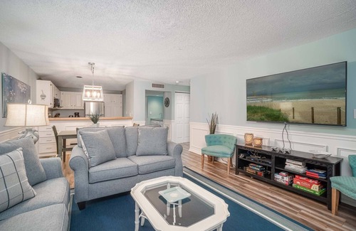 Pine Knoll Shores Condo | Beachwalk 115 - Pine Knoll Shores Oceanfront Condo! Steps to beach. Sleeps 8!