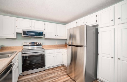 Pine Knoll Shores Condo | Beachwalk 115 - Pine Knoll Shores Oceanfront Condo! Steps to beach. Sleeps 8!
