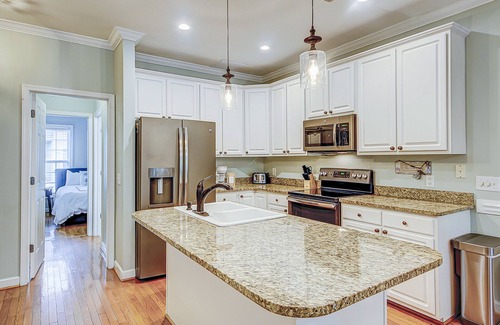 Folly Beach Villa | Beachy, three-story villa w/deck & shared pool - walk downtown & to the beach