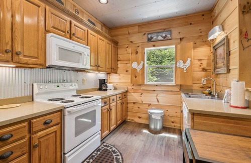 Chalet Village North Cabin | Bearly Hidden: Peaceful Creekside Escape with Hot Tub