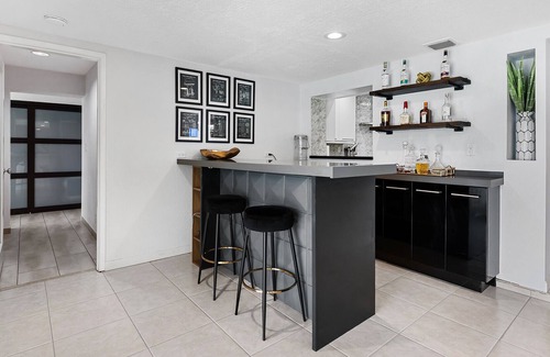 Central Corals House | Beautiful 3bd/2 bath with Pool/Hot tub less than 2 mi from the beach
