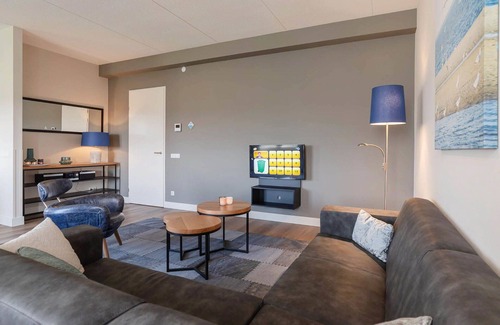 Colijnsplaat Apartment | Beautiful apartment for 4 guests with hot tub, WIFI, TV, balcony and parking
