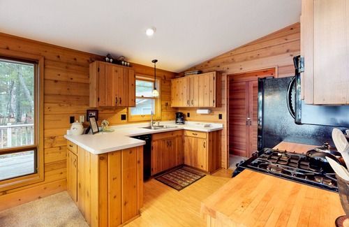 Eagle River House | Beautiful cabin with private dock, canoe, & shared tennis/basketball - dogs OK