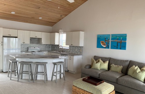 Treasure Cay House | Beautiful Canal Front Home with Private Dock