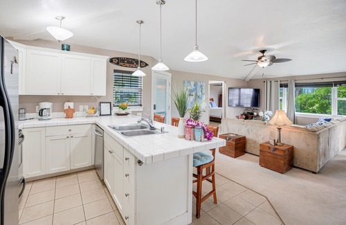 Princeville Condo | Beautiful condo with pool with waterfall, hot tub & mountain view - near shops
