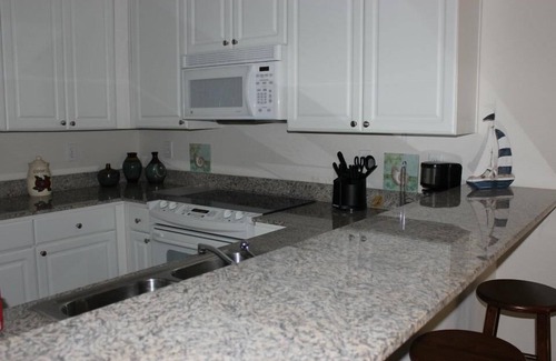Gulf Shores Condo | Beautiful Furnished in Courtyard Overlooking Pool 2nd floor
