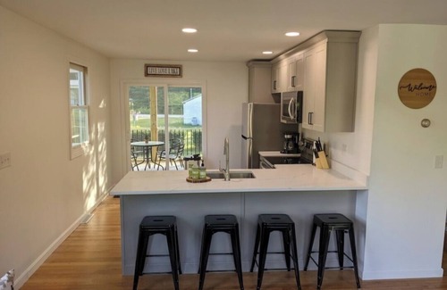 Raymond House | Beautiful home with 150ft sandy beach and private boat launch on Big Sebago!