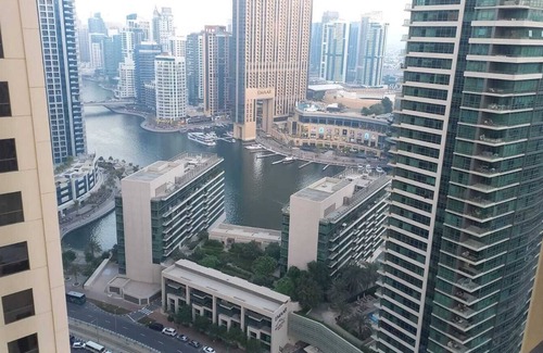 Dubai Marina Apartment | Beautiful hostel boasts modern & stylish accommodations with magnificent views.