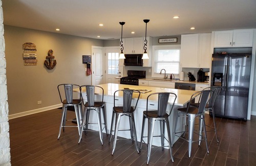 Decatur House | Beautiful Lake House with 150' sandy beach on 85 acre all sports lake