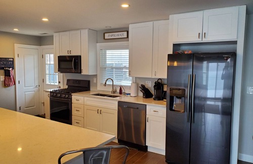 Decatur House | Beautiful Lake House with 150' sandy beach on 85 acre all sports lake