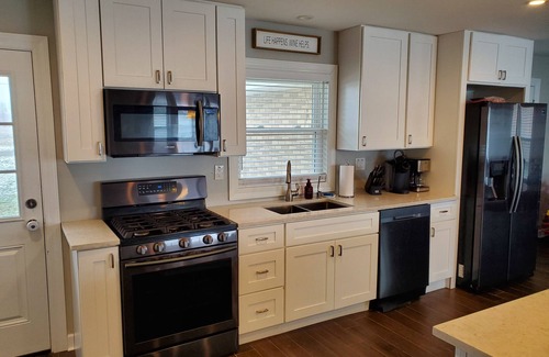 Decatur House | Beautiful Lake House with 150' sandy beach on 85 acre all sports lake
