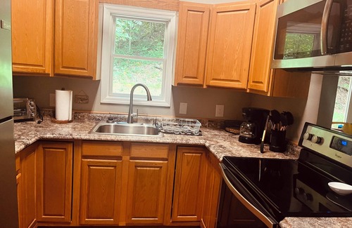 Bryson City House | Beautiful mountain home on 2 acres with a creek.
