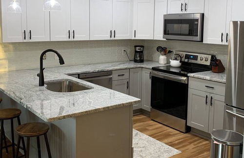 Kelleys Island Condo | Beautiful, newly renovated condo steps from the pool and downtown entertainment!