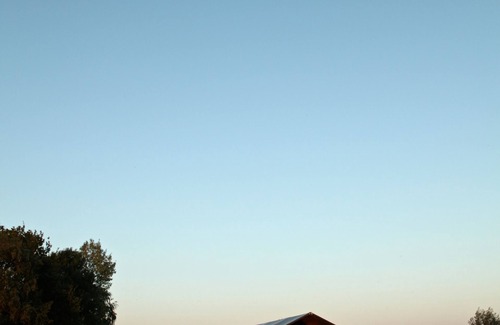 Enumatil Cabin | Beautiful furnished safari tent and circus wagon with private bathroom.