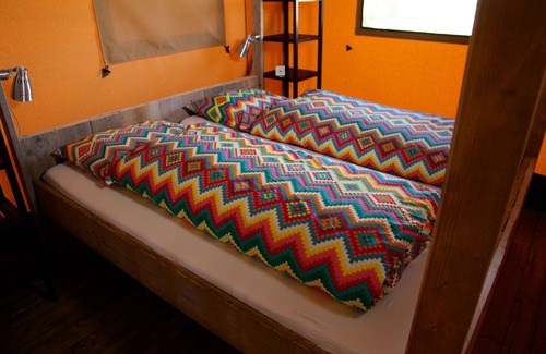Enumatil Cabin | Beautiful furnished safari tent and circus wagon with private bathroom.