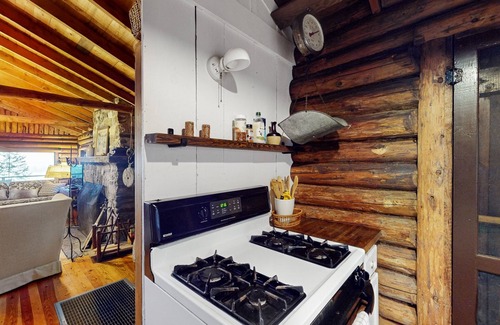 Boothbay Harbor Cabin | Beautiful, rustic cabin overlooking Lewis Cove with porch, deck & fireplace