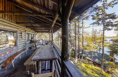 Boothbay Harbor Cabin | Beautiful, rustic cabin overlooking Lewis Cove with porch, deck & fireplace