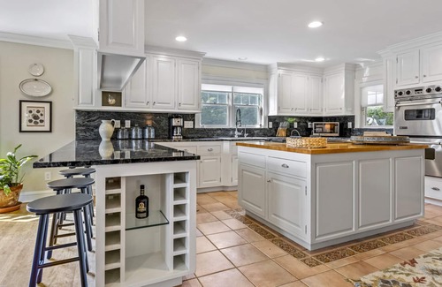 Shinnecock Hills House | Beautiful Southampton Home with breathtaking waterfront views, front porch,.