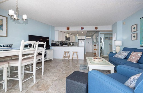 Midtown Ocean City Condo | Beautiful sunset and ocean view from 2 Bedroom Condo with Free WiFi and an Outdoor Pool Located in Midtown Only Steps to Beach!