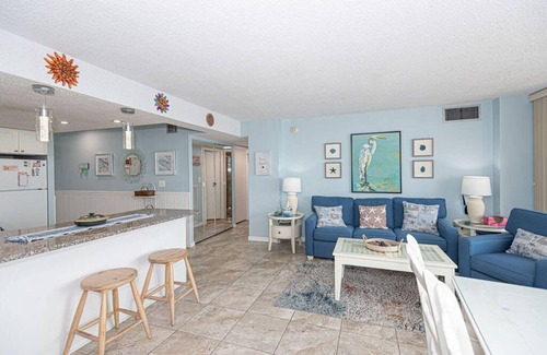 Midtown Ocean City Condo | Beautiful sunset and ocean view from 2 Bedroom Condo with Free WiFi and an Outdoor Pool Located in Midtown Only Steps to Beach!