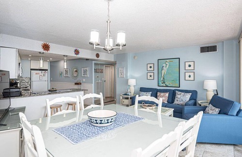 Midtown Ocean City Condo | Beautiful sunset and ocean view from 2 Bedroom Condo with Free WiFi and an Outdoor Pool Located in Midtown Only Steps to Beach!