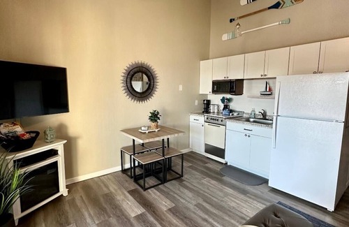 Osage Beach Condo | BEAUTIFUL Updated Condo ON THE WATER!Lake main channel & pool views! Boat Slip!