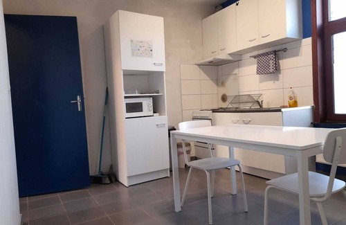 Nimy House | Bedroom 2 With TV, Wifi and Fridge