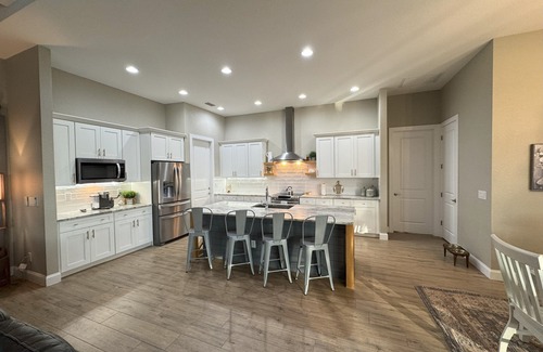 South Gulf Cove House | Bela-Vita-Charming 3-bedroom canal front pool home with 2 master suites