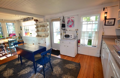 Spruce Head Cottage | Berry Cottage, private dock, overlooking a sandy beach and bustling harbor