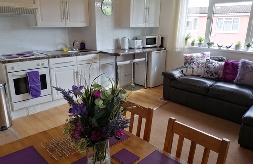 Paignton Apartment | Best location! 2 mins from Paignton's sandy beach and pier. Outdoor heated pool