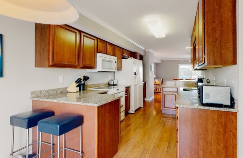 Ocean View Condo | Bethany Marina bayfront condo with pool, fireplace, water views