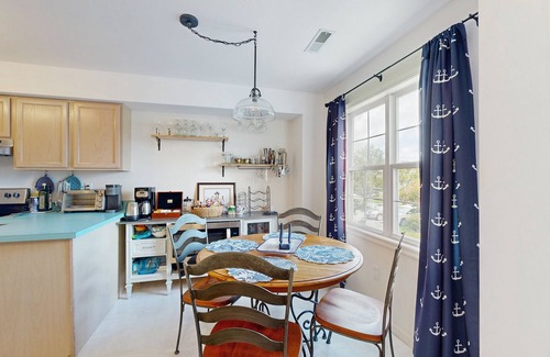 Ocean View House | Bethany Marina dog friendly bayfront townhouse w/pool, balcony, grill