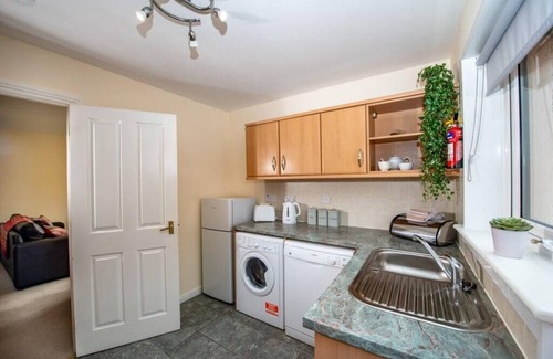 Aviemore Apartment | Birchwood Cottage is a three bedroom detached pet friendly property with enclosed garden with BBQ, b