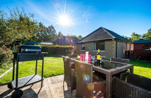 Aviemore Apartment | Birchwood Cottage is a three bedroom detached pet friendly property with enclosed garden with BBQ, b