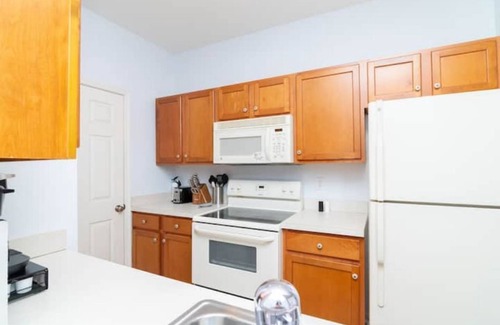 Lewes House | Blissful Bay Crossing condo- RT 1 - community pool