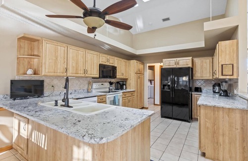 Palm Harbor House | Blue Haven Large Waterfront Pool Home | Boat Dock | Canal | Water Views | Pool Bar | WIFI | Fishing