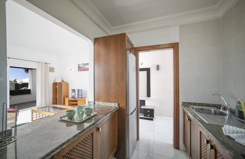 Playa Blanca Villa | Blue Heron Property with a Hot tub and 5 minutes walk to the Sea front Promenade