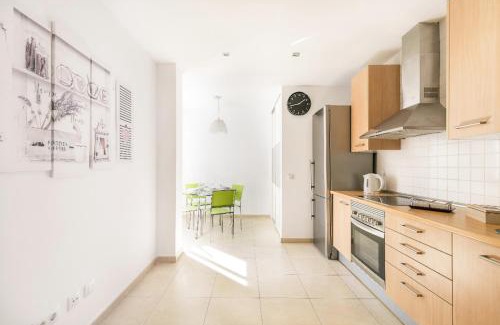 Vecindario Apartment | Blue & White House