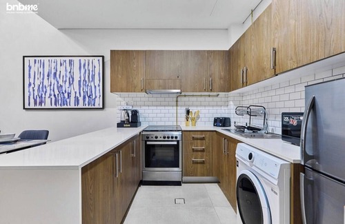 Jumeirah Village Circle Apartment | bnbme | Stylish JVC Apartment | Pool & Private Patio
