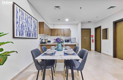 Jumeirah Village Circle Apartment | bnbme | Stylish JVC Apartment | Pool & Private Patio