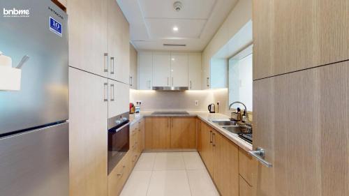 Emirates Hills 2 Apartment | bnbmehomes - Vida Residence A1