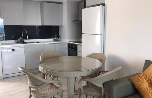 Milas Apartment | Bodrum. Wohnung mit Meerblick, Privatem Strand, Aquapark und Infinity Pool
